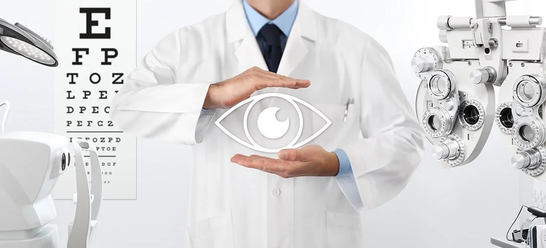A doctor in a white coat standing in an eye clinic, with eye examination equipment and an eye chart visible, holding a digital eye symbol.