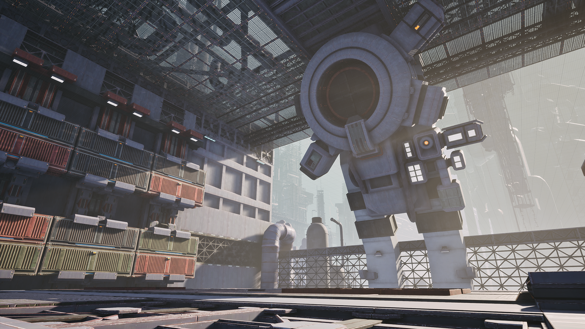 Large futuristic robot standing in a cargo storage area with stacked shipping containers and industrial buildings in the background.