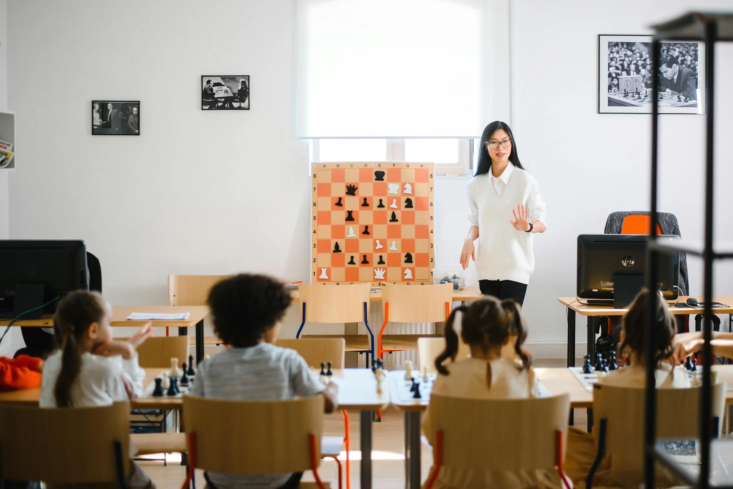 chess class with kids paying attention.jpg