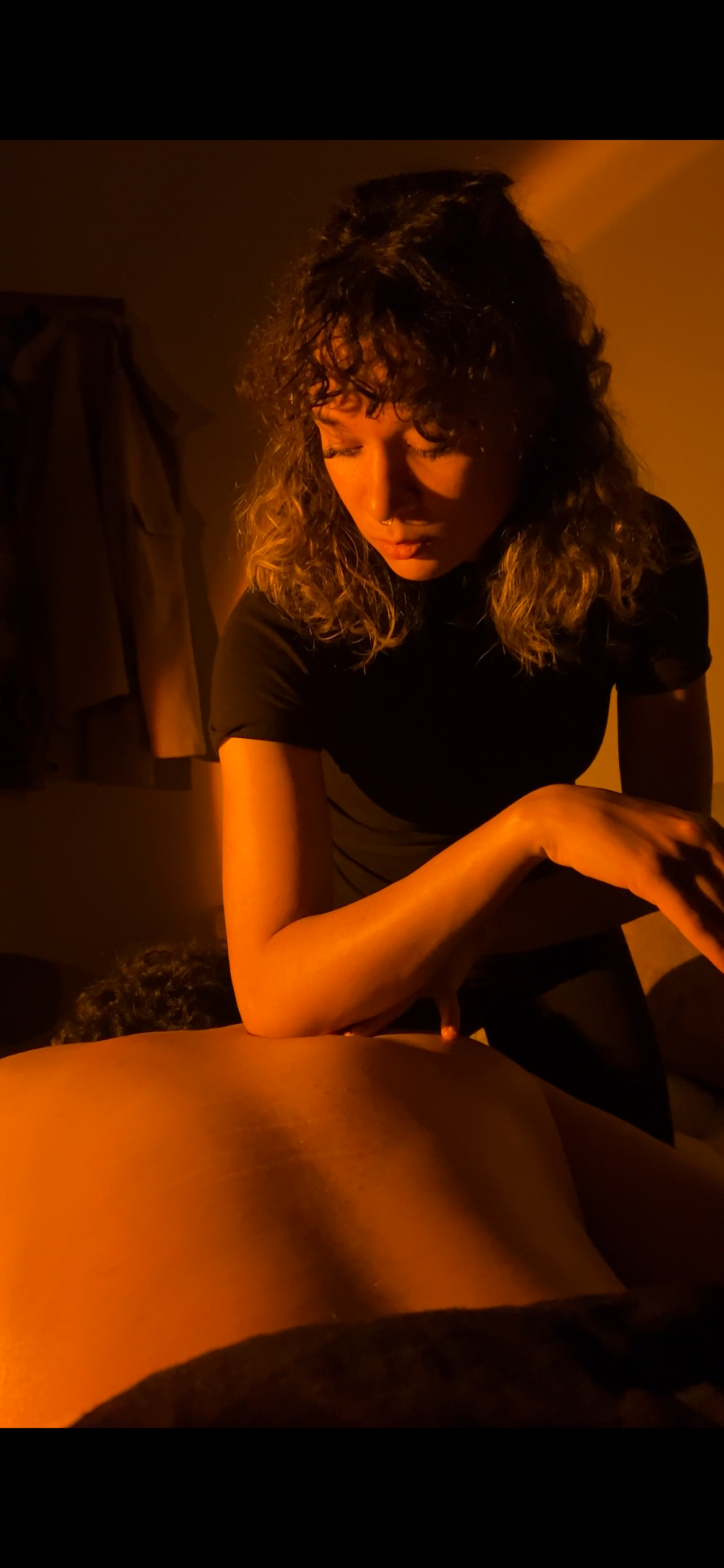 A massage therapist providing deep tissue.