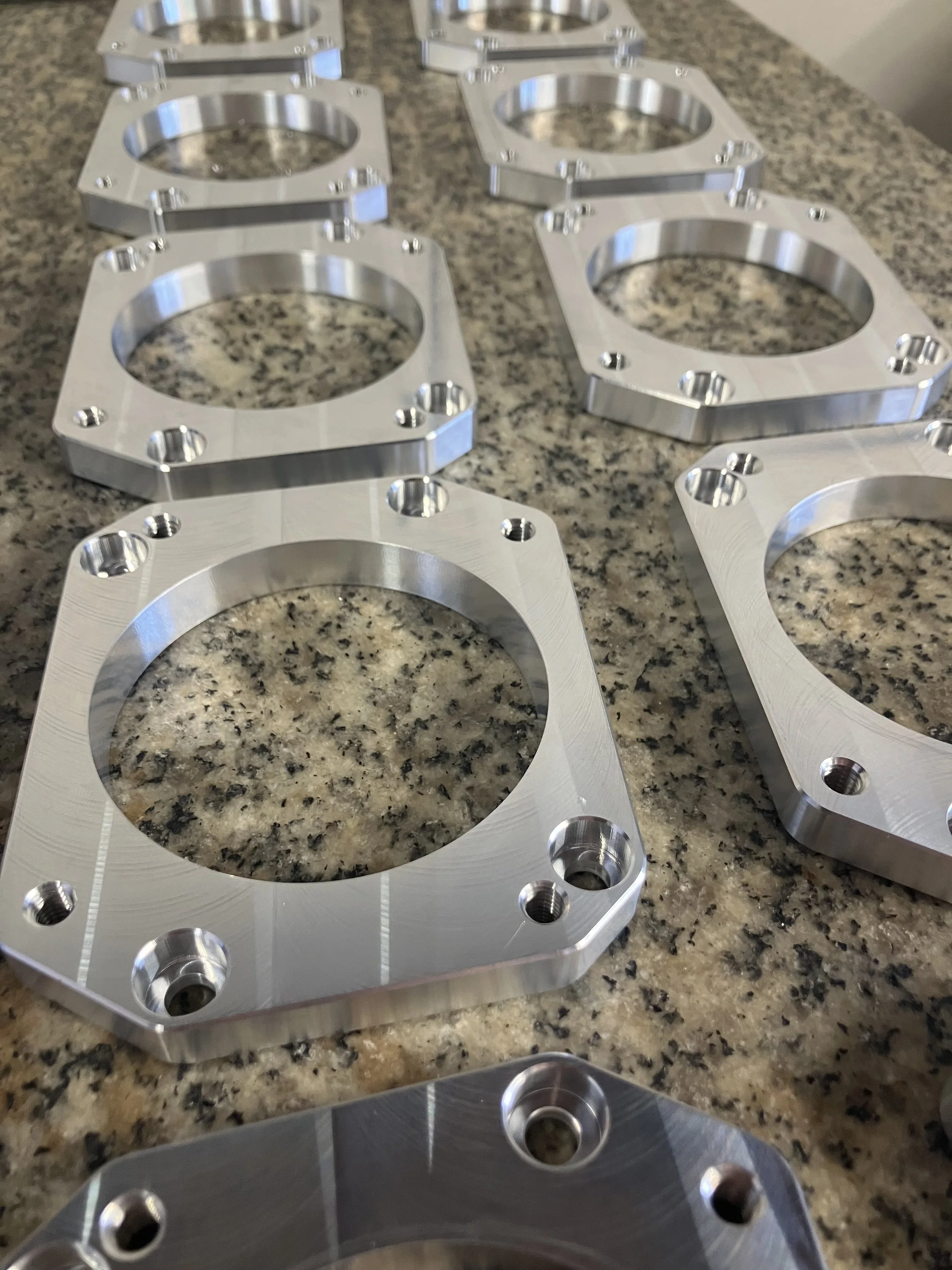 MANIFOLD ADAPTORS ON SURFACE PLATE.jpeg