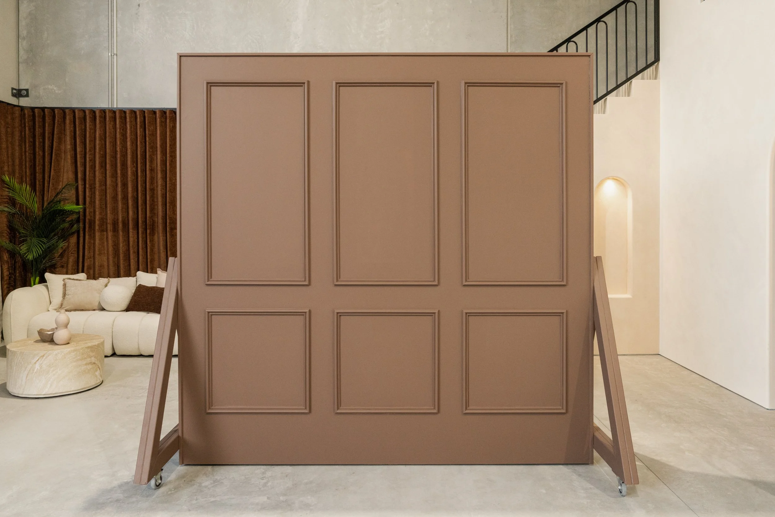 Luxurious wainscoting detail on a portable back drop