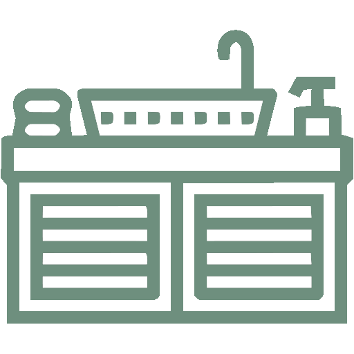 Kitchen sink with a soap dispenser, faucet, and cabinets underneath