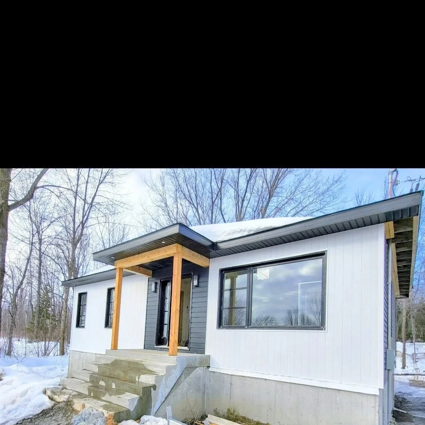 revetement maison  blanc et noir style farmhouse 