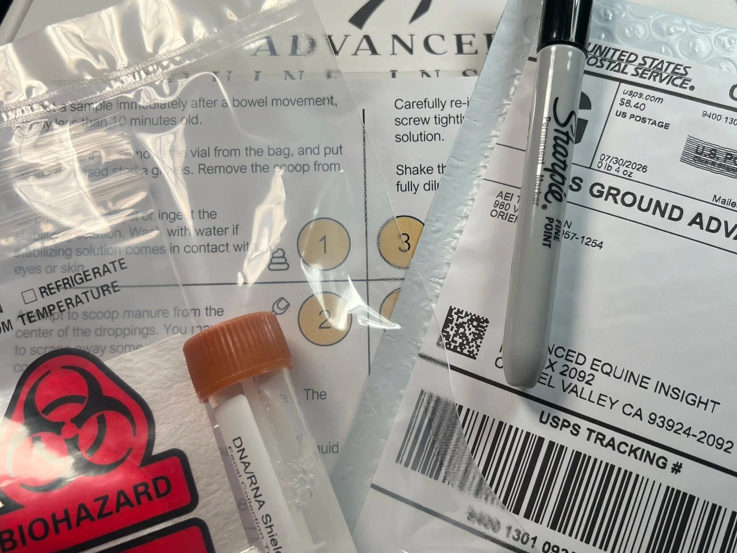 Equine microbiome test kit supplies including sample vial and return shipping label to complete your equine gut microbiome test