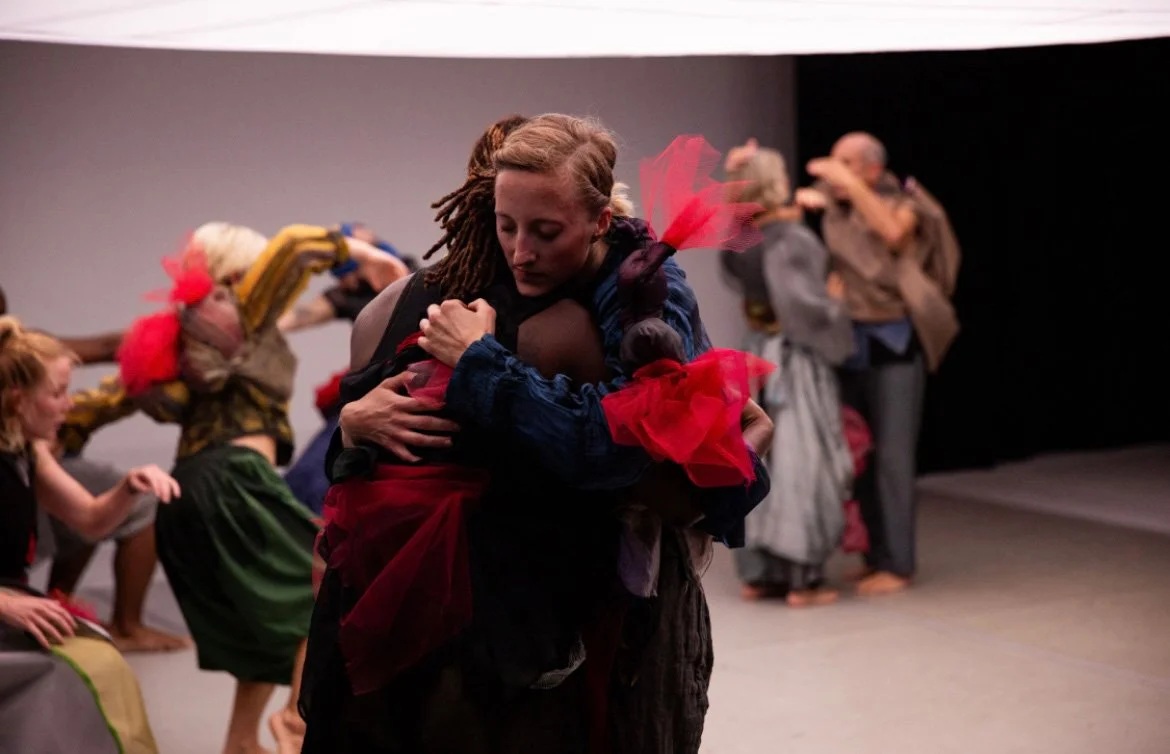 Michaela Ellingson dancing on stage with other performers.