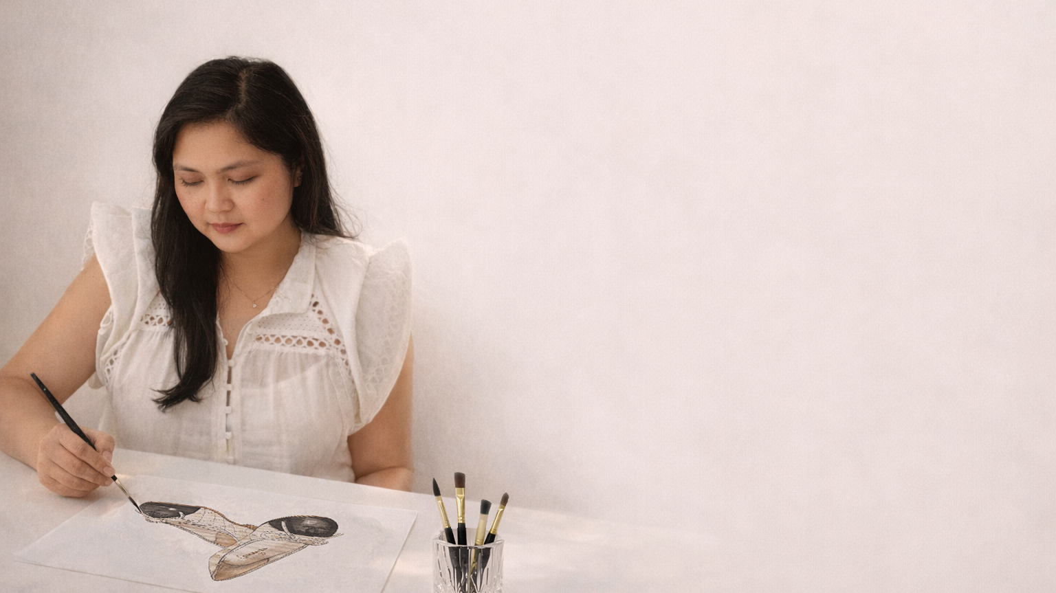 Crystal, a Melbourne live illustrator, drawing a fashion illustration for weddings and brand activations.