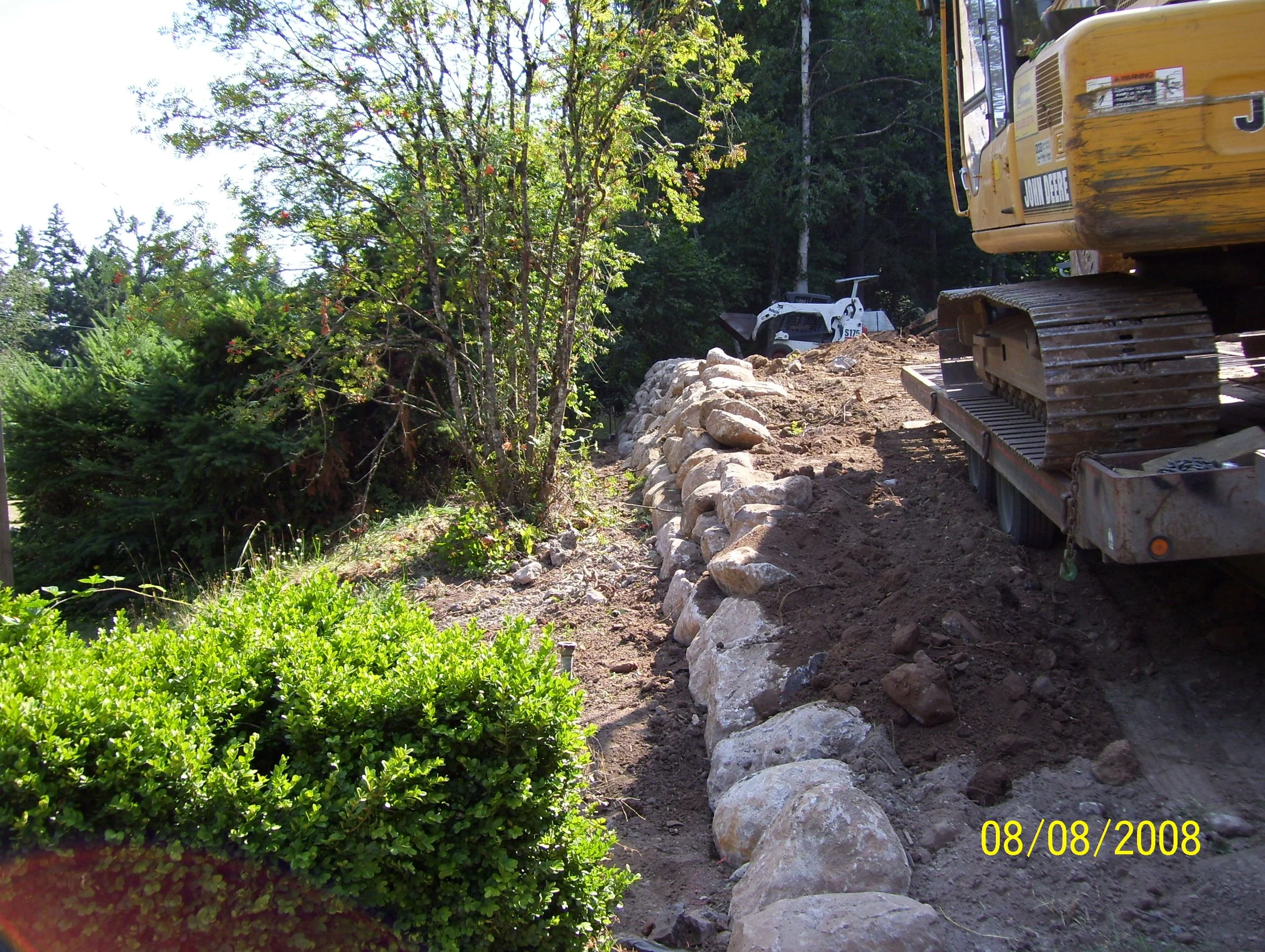 boulder retaining wall.JPG