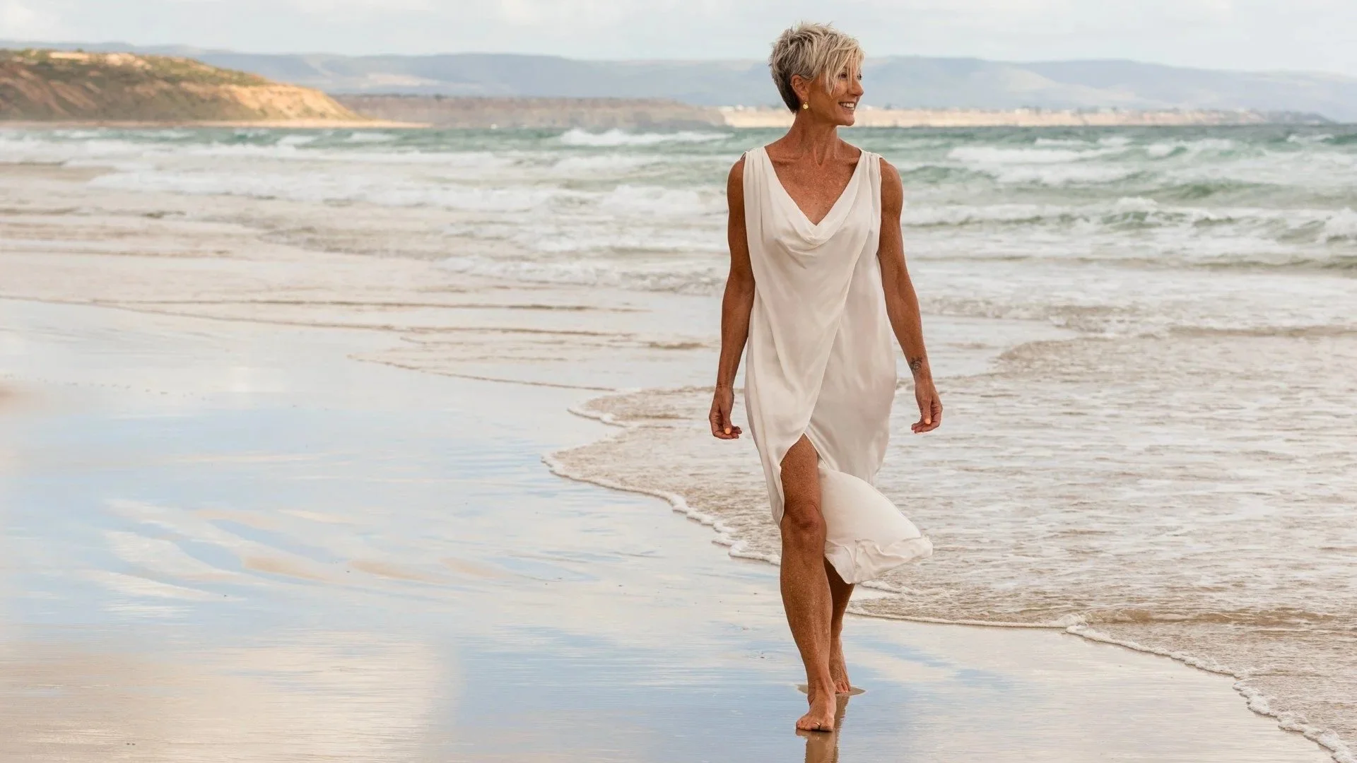 Liesl walking along beach