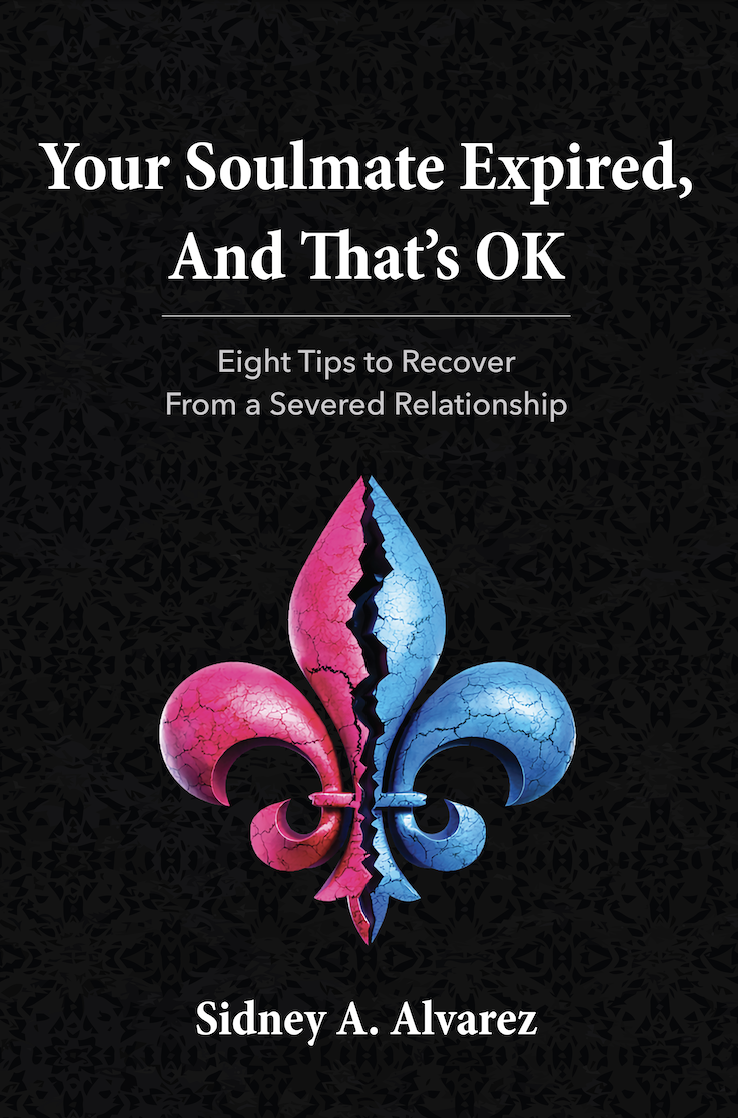 Book cover titled "Your Soulmate Expired, And That's OK: Eight Tips to Recover From a Severed Relationship" by Sidney A. Alvarez, featuring a cracked, split fleur-de-lis symbol in pink and blue against a black background.