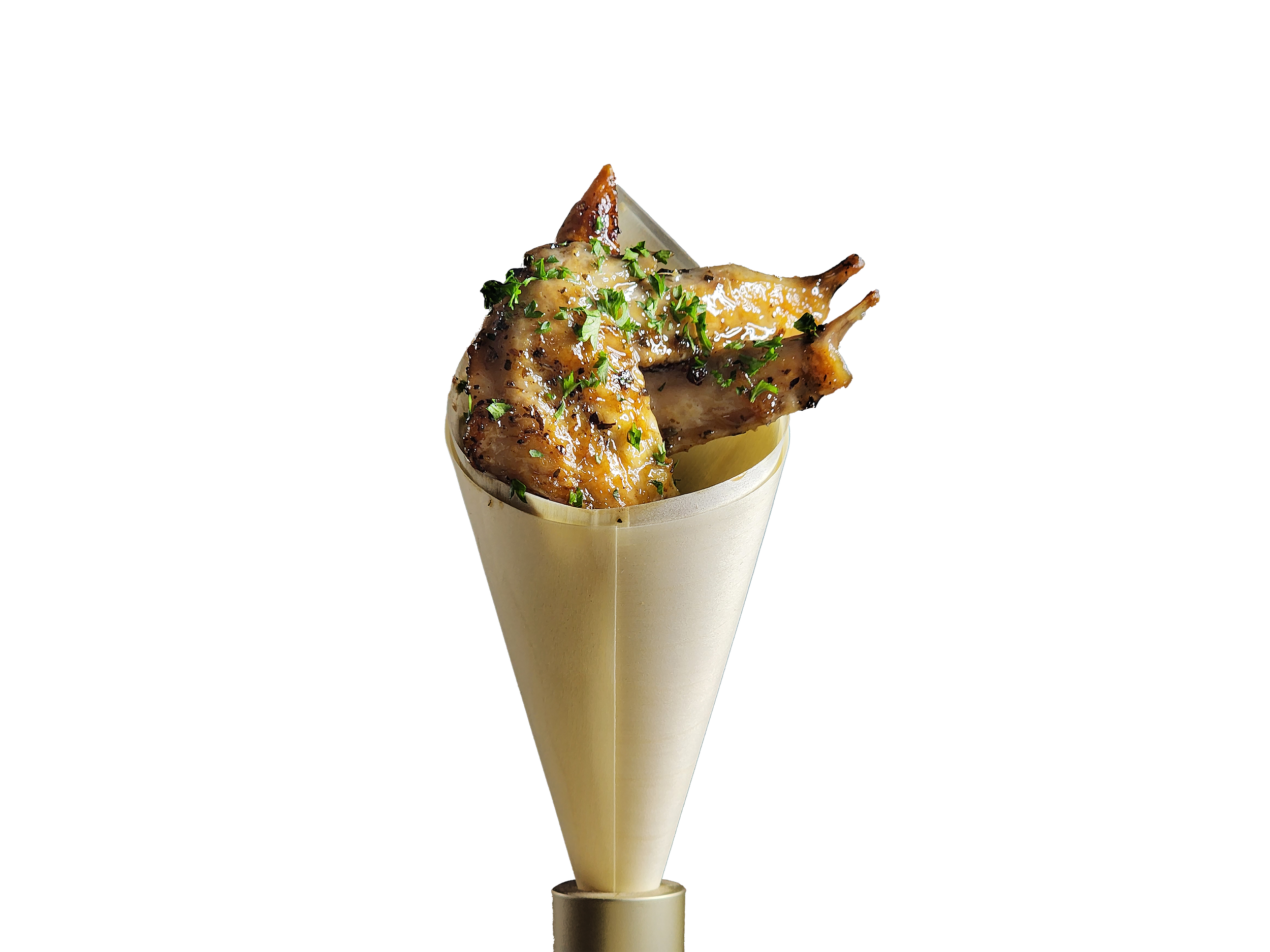 Glazed chicken wings served in a paper cone