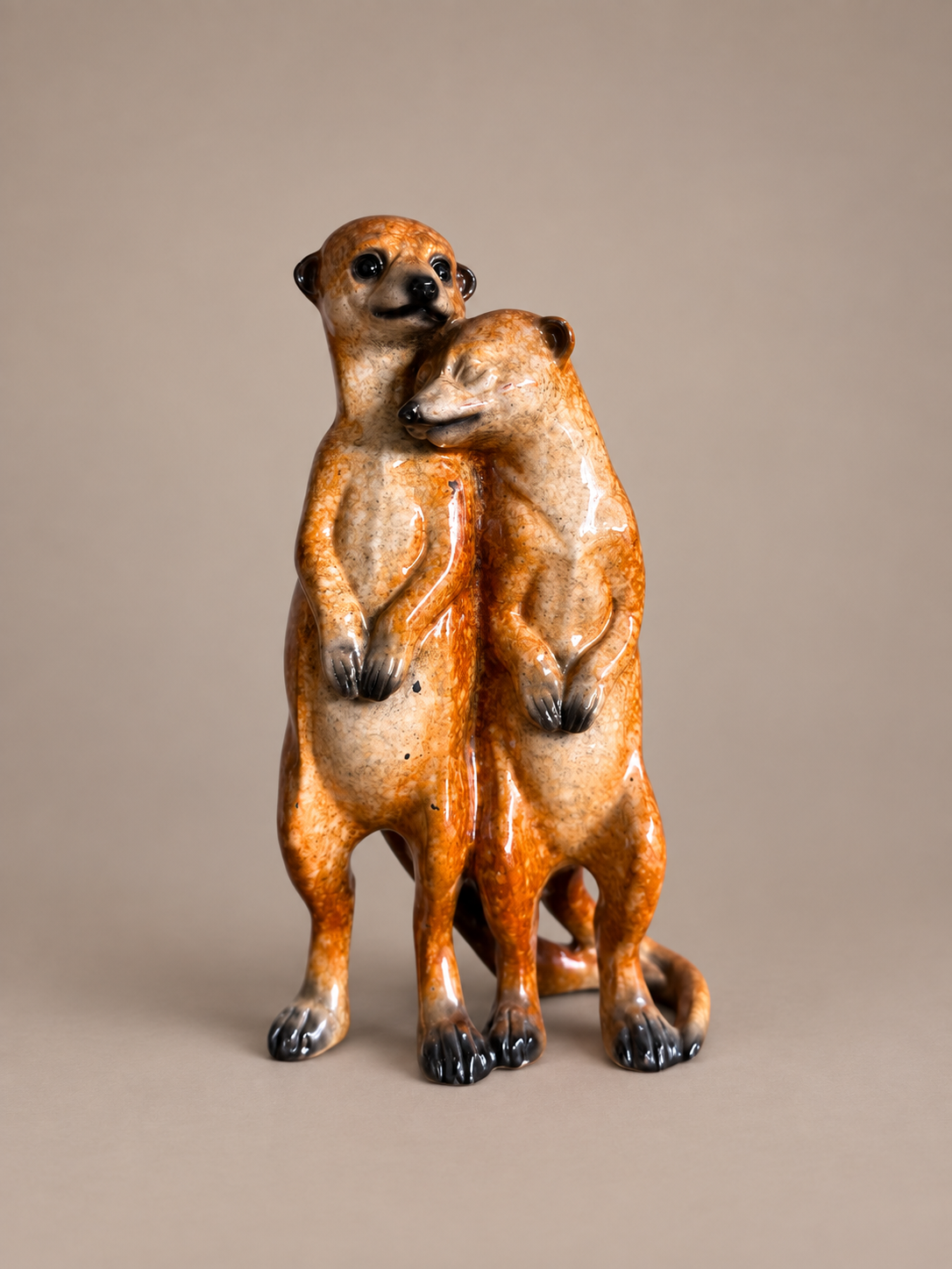Cuddling Ceramic Meerkats 2 .png