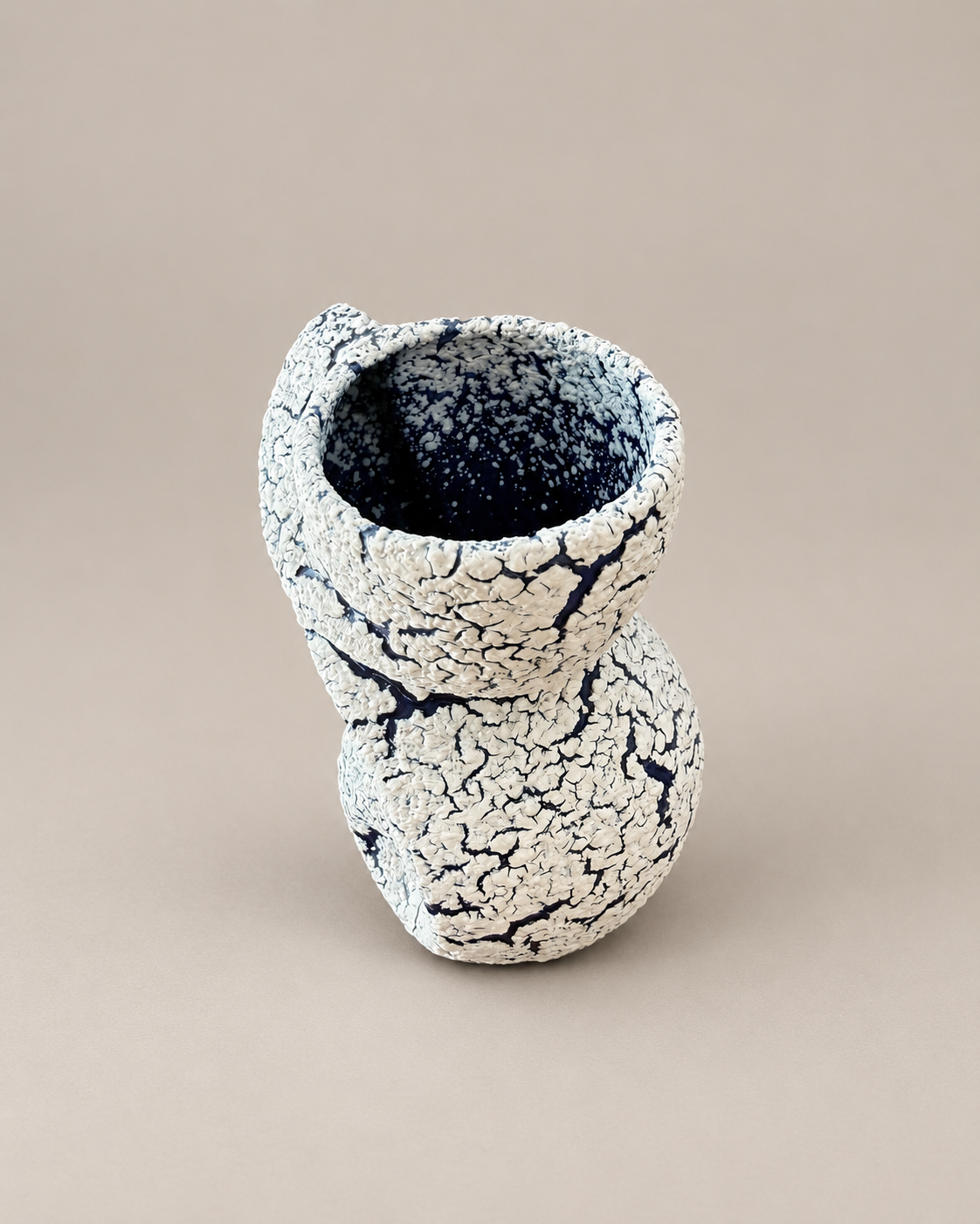 Jopeko Blue & White Sculptural Vase.png