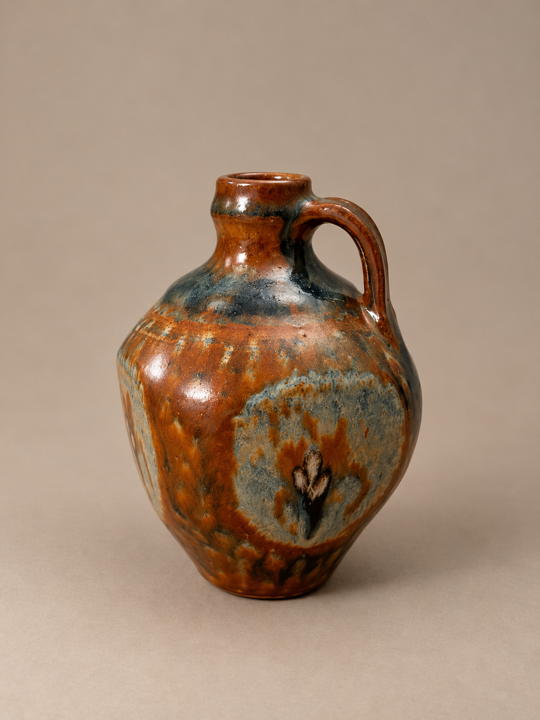 Rustic Reactive-Glaze Ceramic Jug.png