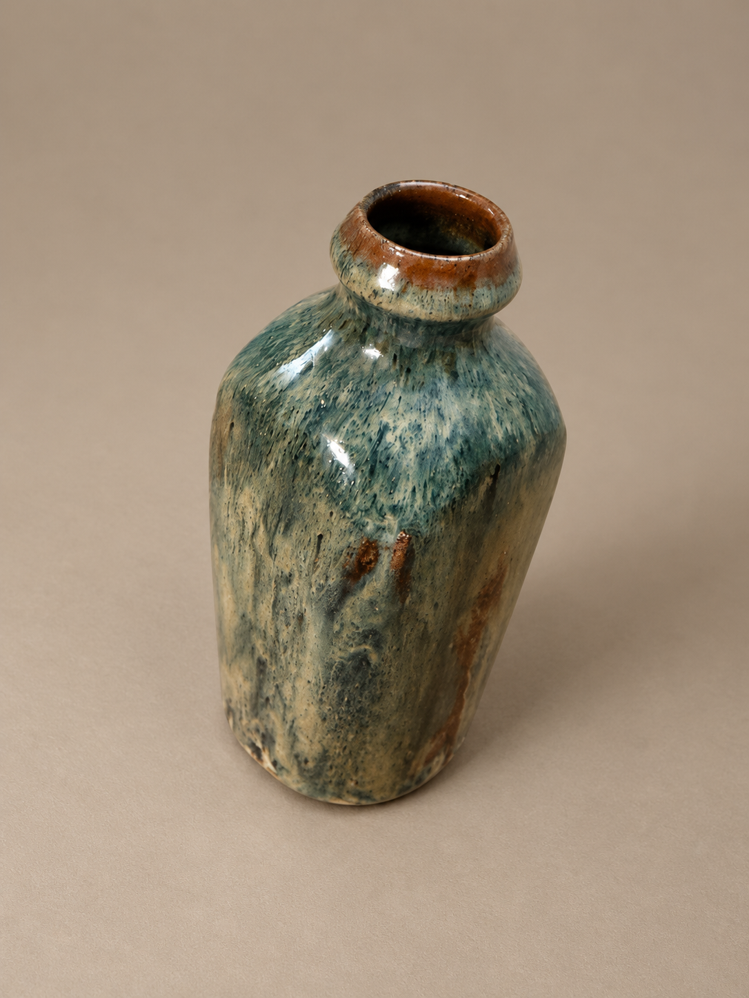 Mottled Teal and Rust Ceramic Vase.png