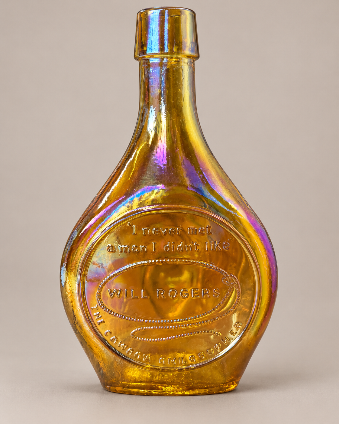 Iridescent Will Rogers Amber Bottle.png