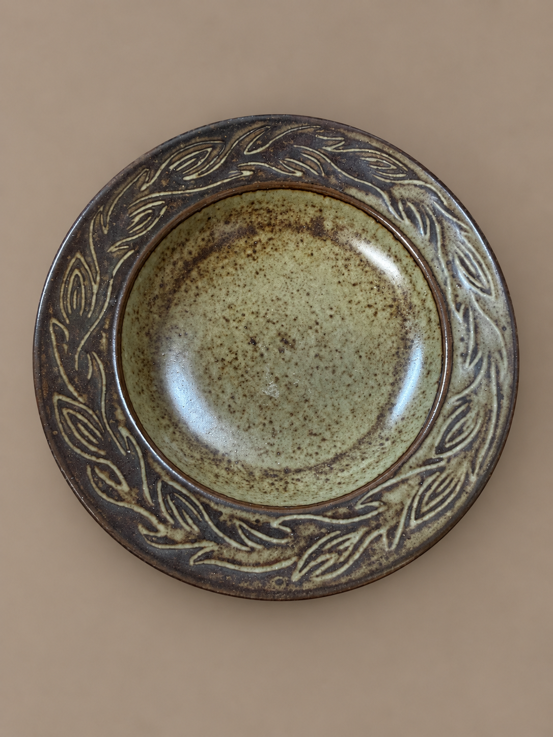 Earthy Leaf-Motif Stoneware Bowl.png