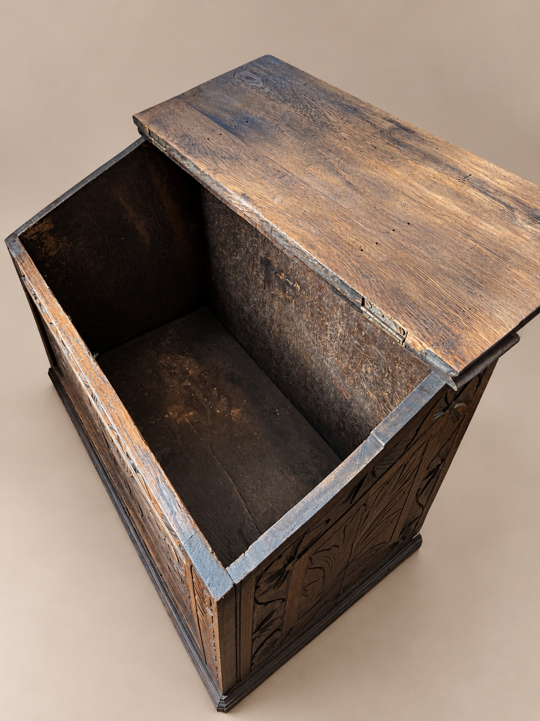 Antique Carved Chest with Open Lid.png