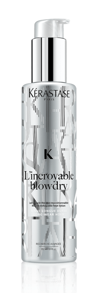 A silver bottle of Kérastase L'incroyable blowdry hair lotion with a pump dispenser.
