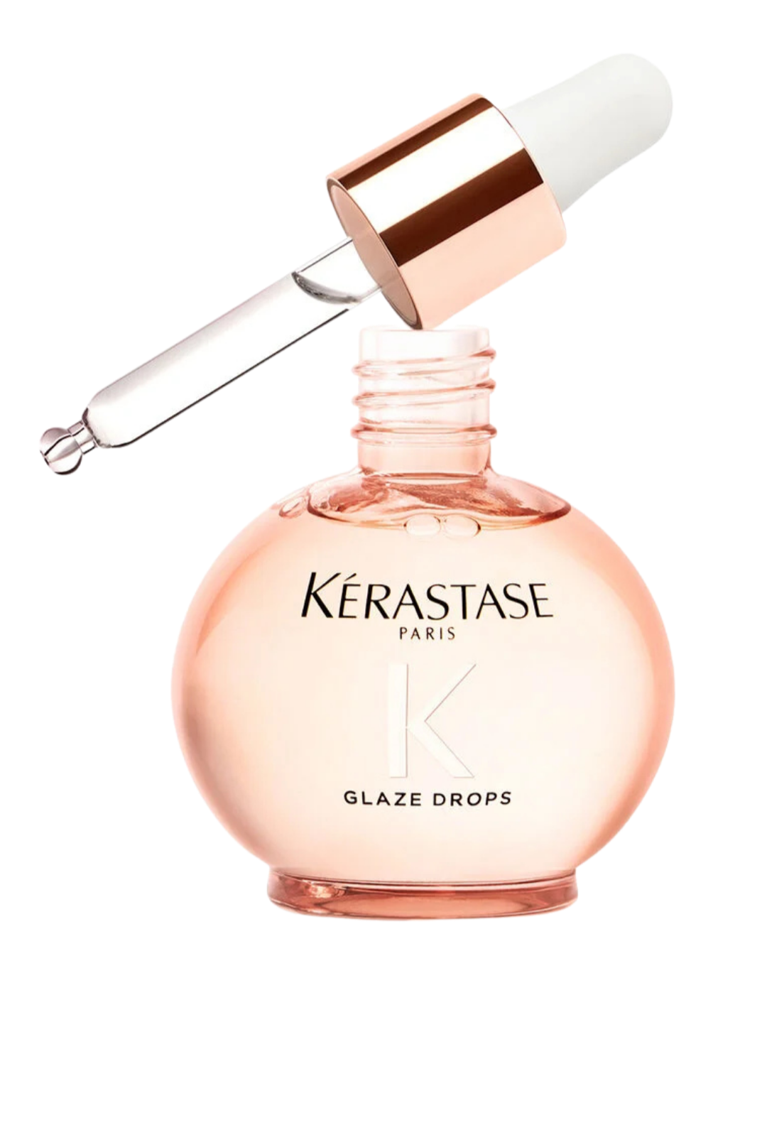 A bottle of Kérastase Paris glaze drops hair treatment with a dropper