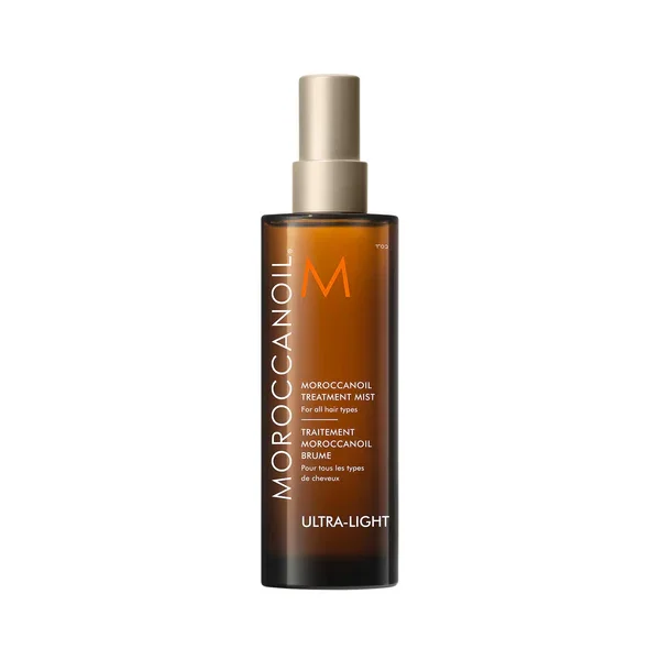 Bottle of Moroccanoil Moroccan Oil Treatment Mist for all hair types with a gold spray cap.