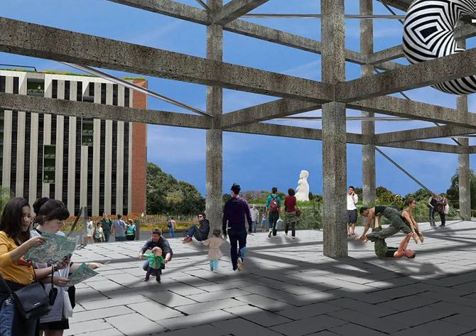 People walking and sitting outdoors under a large concrete structure, with a tall building and sculpture in the background.