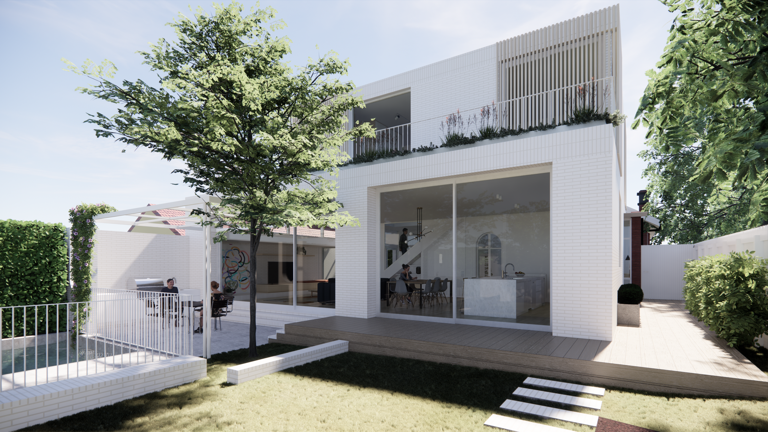 Modern white two-story house with open patio and outdoor seating area, surrounded by green trees and landscaped yard, under a clear blue sky.