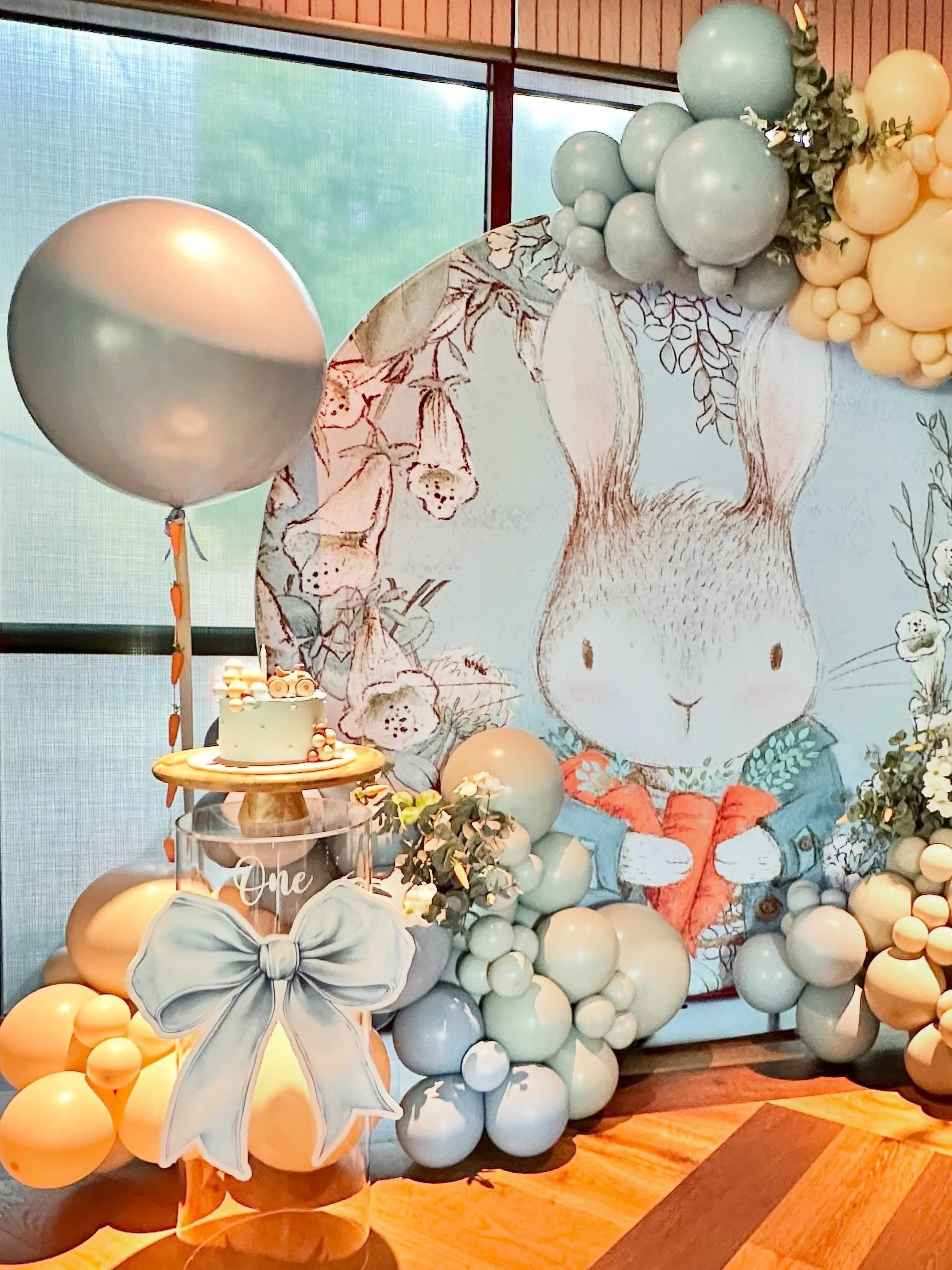 Peter Rabbit 1st Birthday styled with our themed Peter Rabbit backdrop, soft pastel balloons &amp; personalised party decor for a storybook setting

View our Themed Backdrop collection on the website. Peter Rabbit backdrop designed by &amp; exclusive