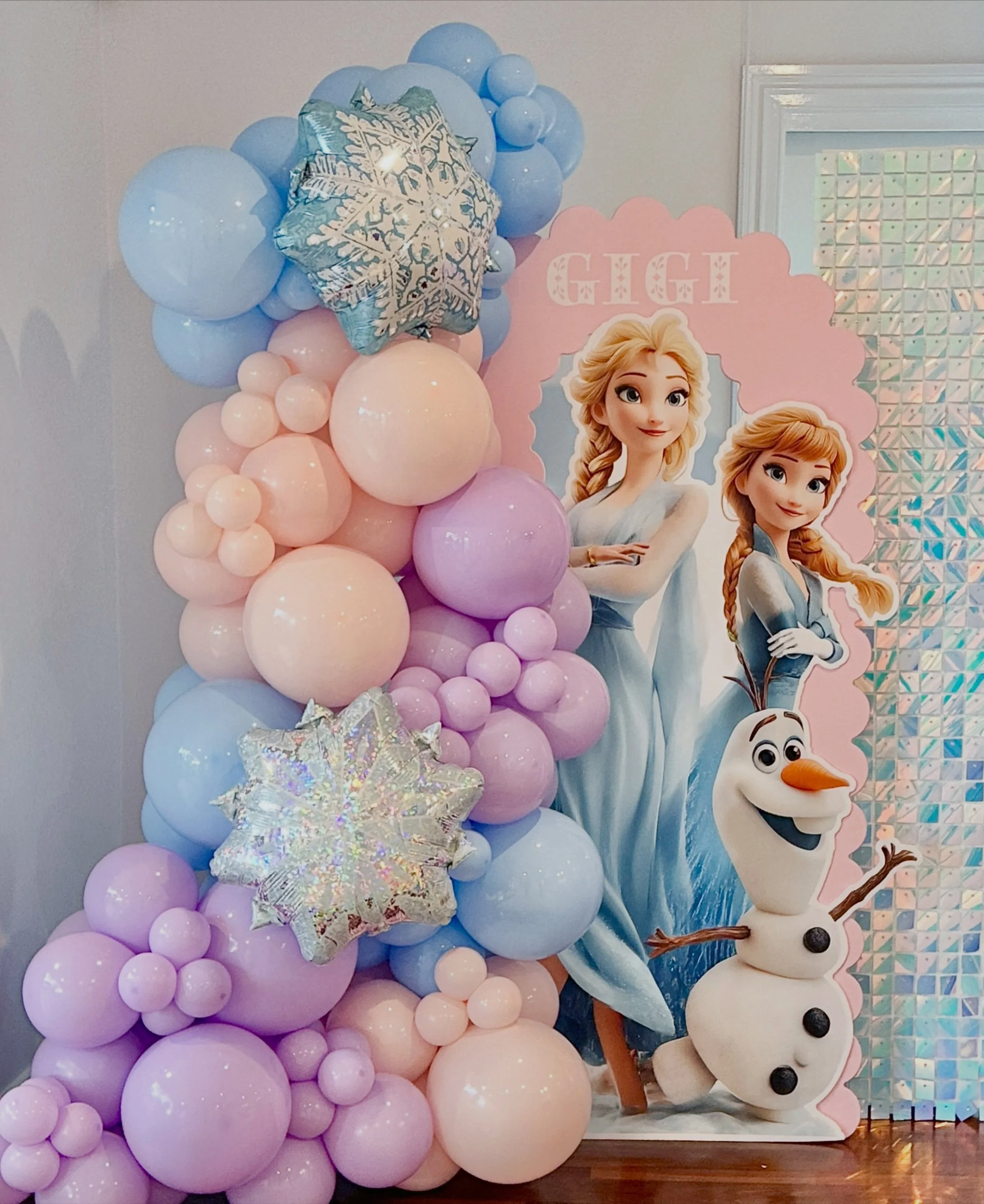 Another request for our gorgeous Frozen party backdrop and why not! Frozen is a magical party theme kids absolutely love

Inspired by the popular Disney movies, a Frozen birthday party is full of shimmery details, sparkling snowflakes, pastel balloon