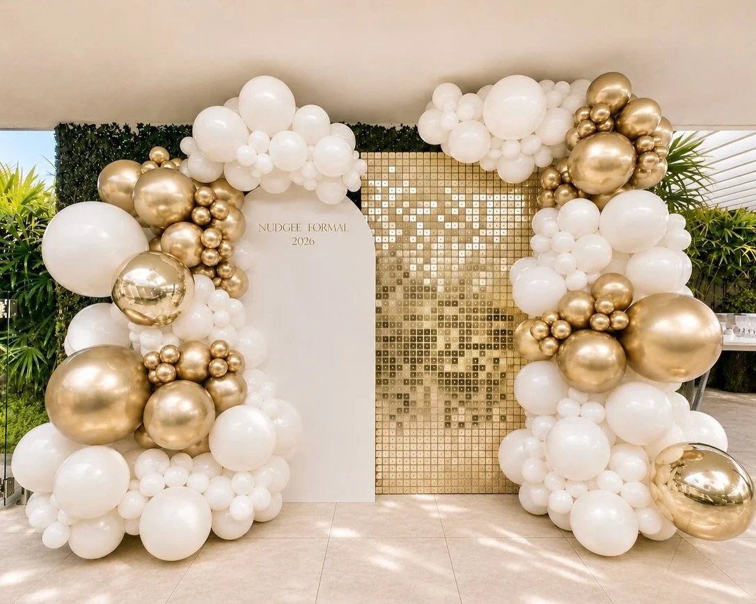 Nudgee Formal 2026 🎓 Designed to make an impact by day &rarr; and wait until you see it after dark ✨

A little gold, a lot of glamour and a beautiful setting for a very special night.

For the Nudgee Formal 2026, we created a statement formal backdr