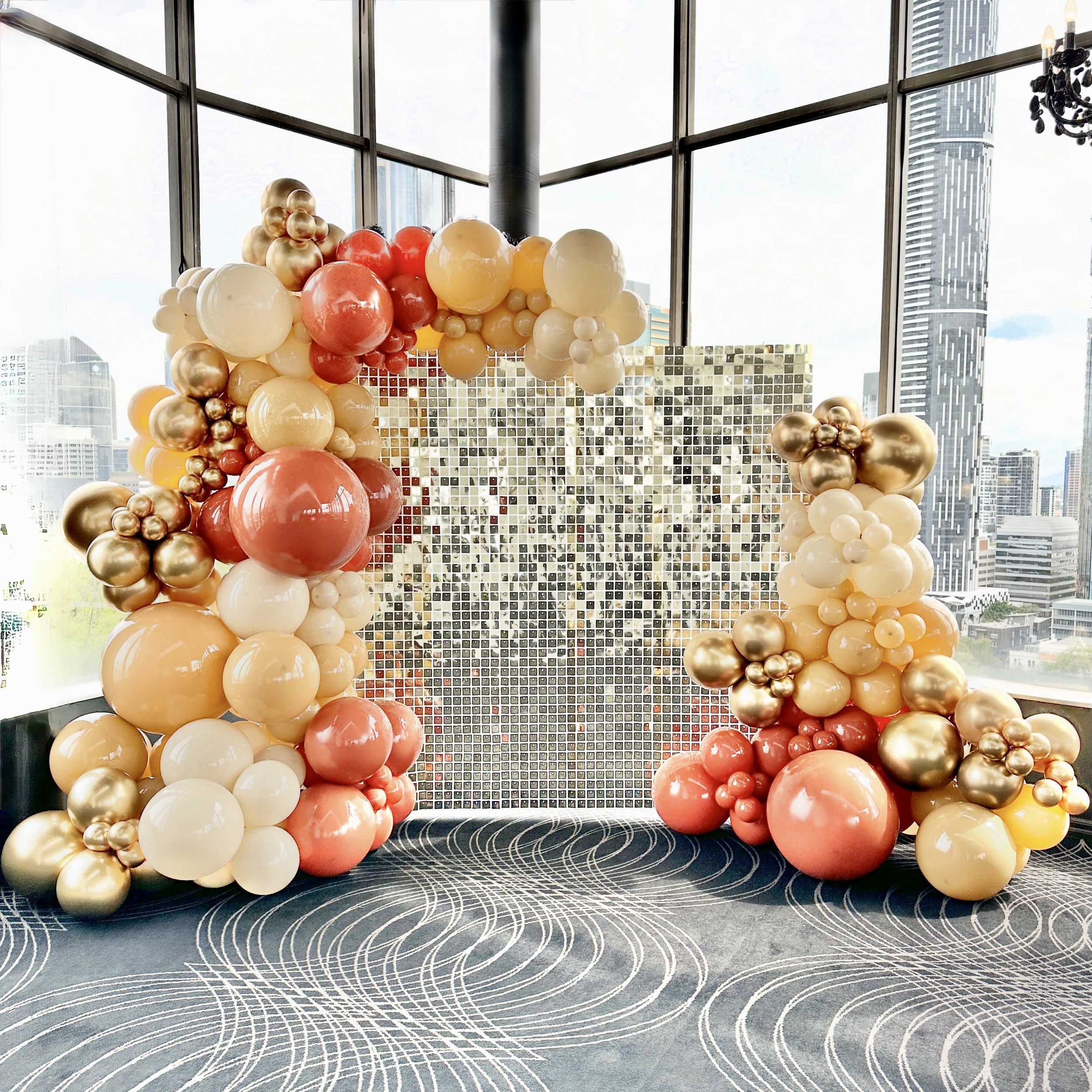 Gold Shimmer Wall for Cowboy themed party.jpg