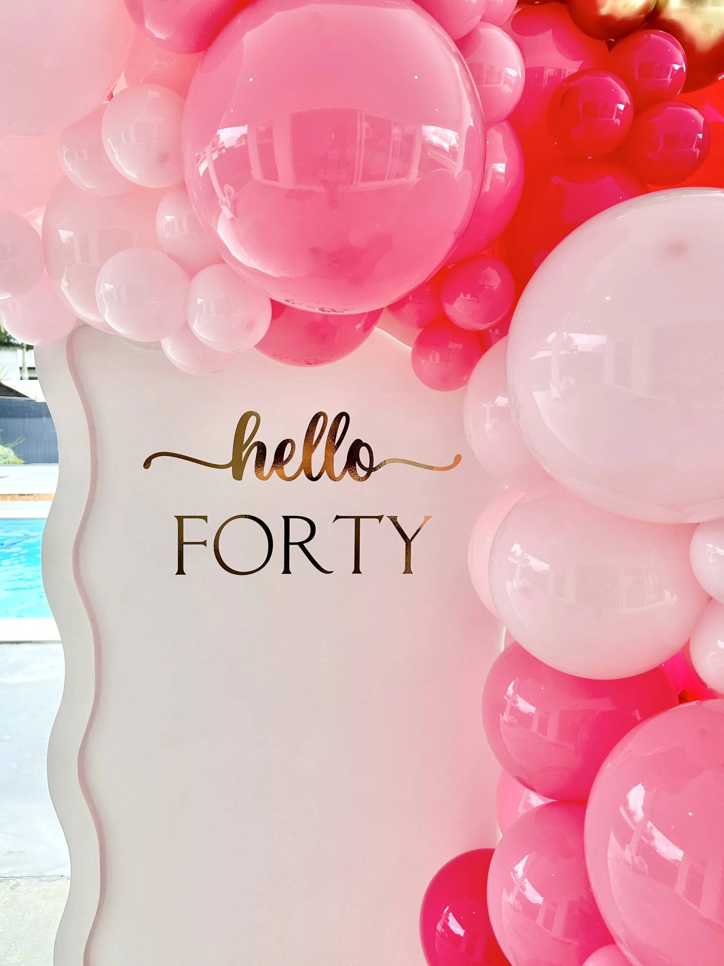 Marisol Wavy Backdrop with personalised decal.JPG