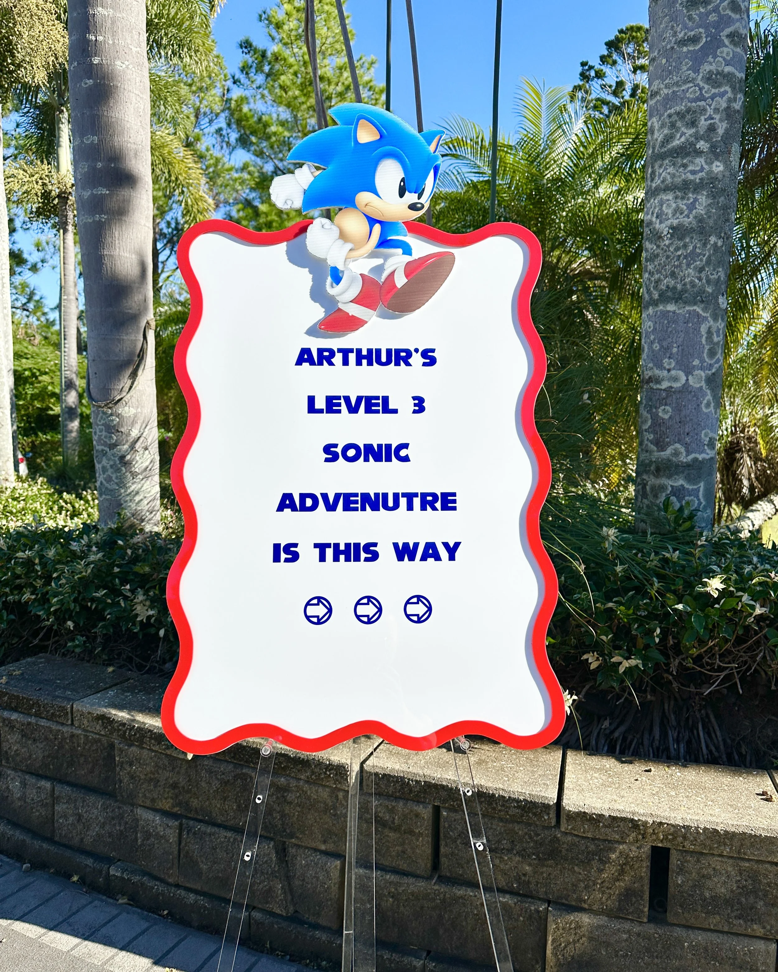 Sonic themed wavy event sign
