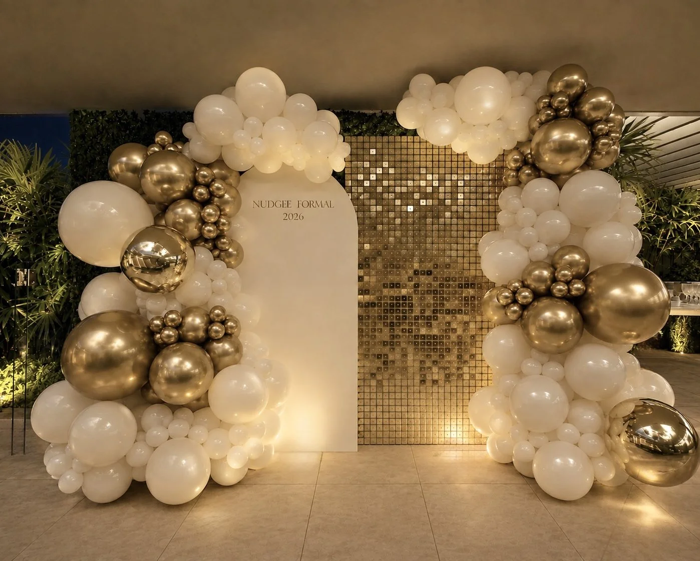 Balloon arch with white, gold, and metallic balloons surrounding a white arch backdrop - Brisbane Balloons - Brisbane Party Hire - Gold Coast Balloons - Print Candy