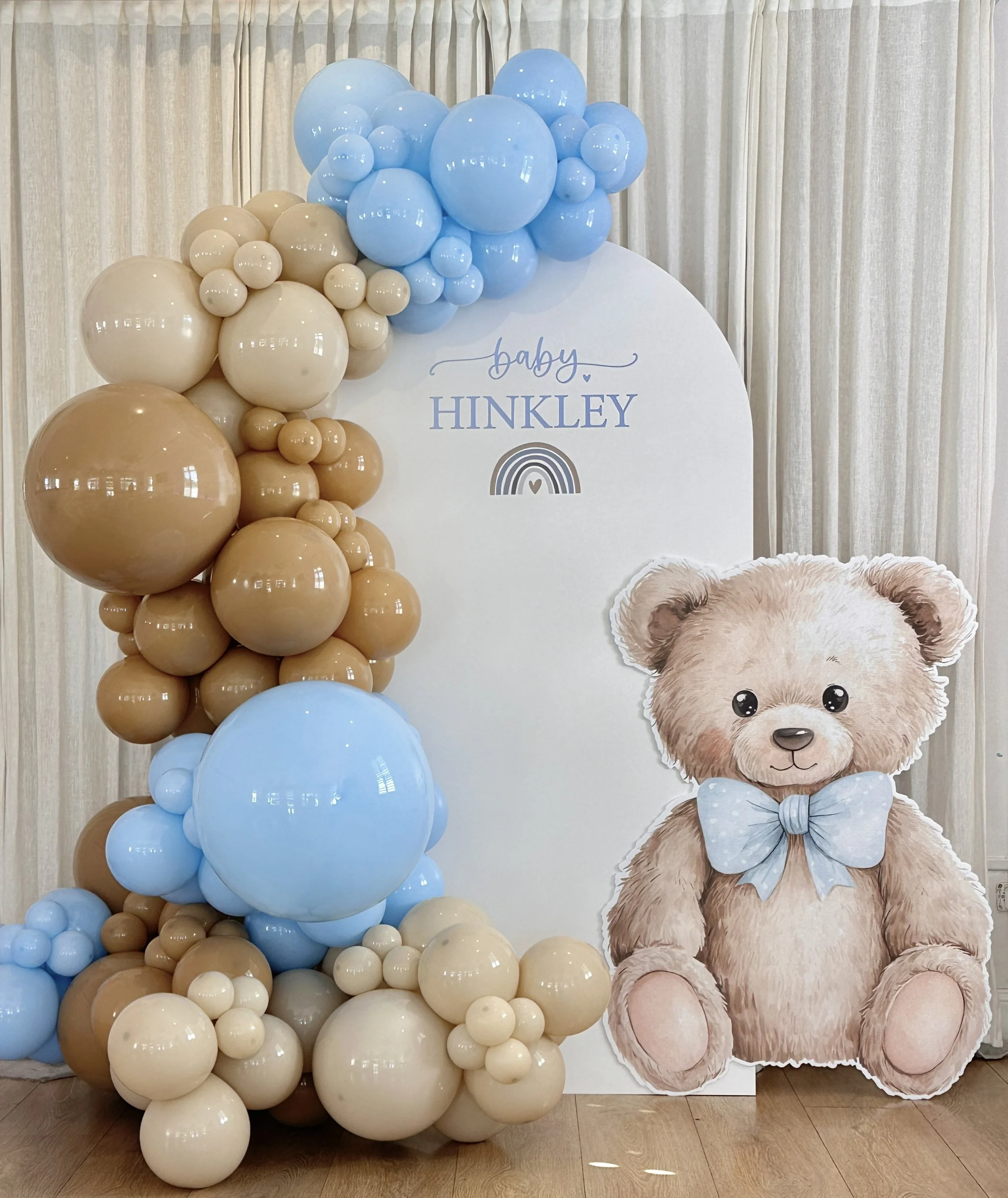 Teddy Bear set up with arch backdrop, balloons and teddy bear stand.JPG
