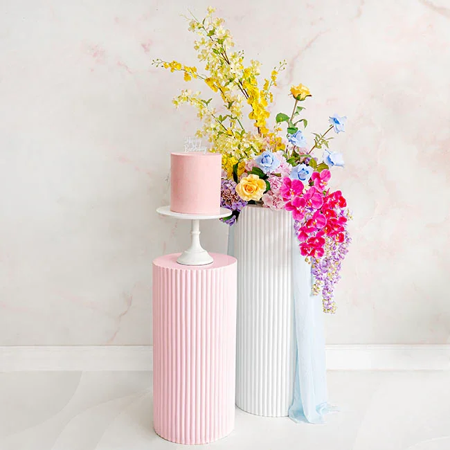 Pink and white ripple cake plinths