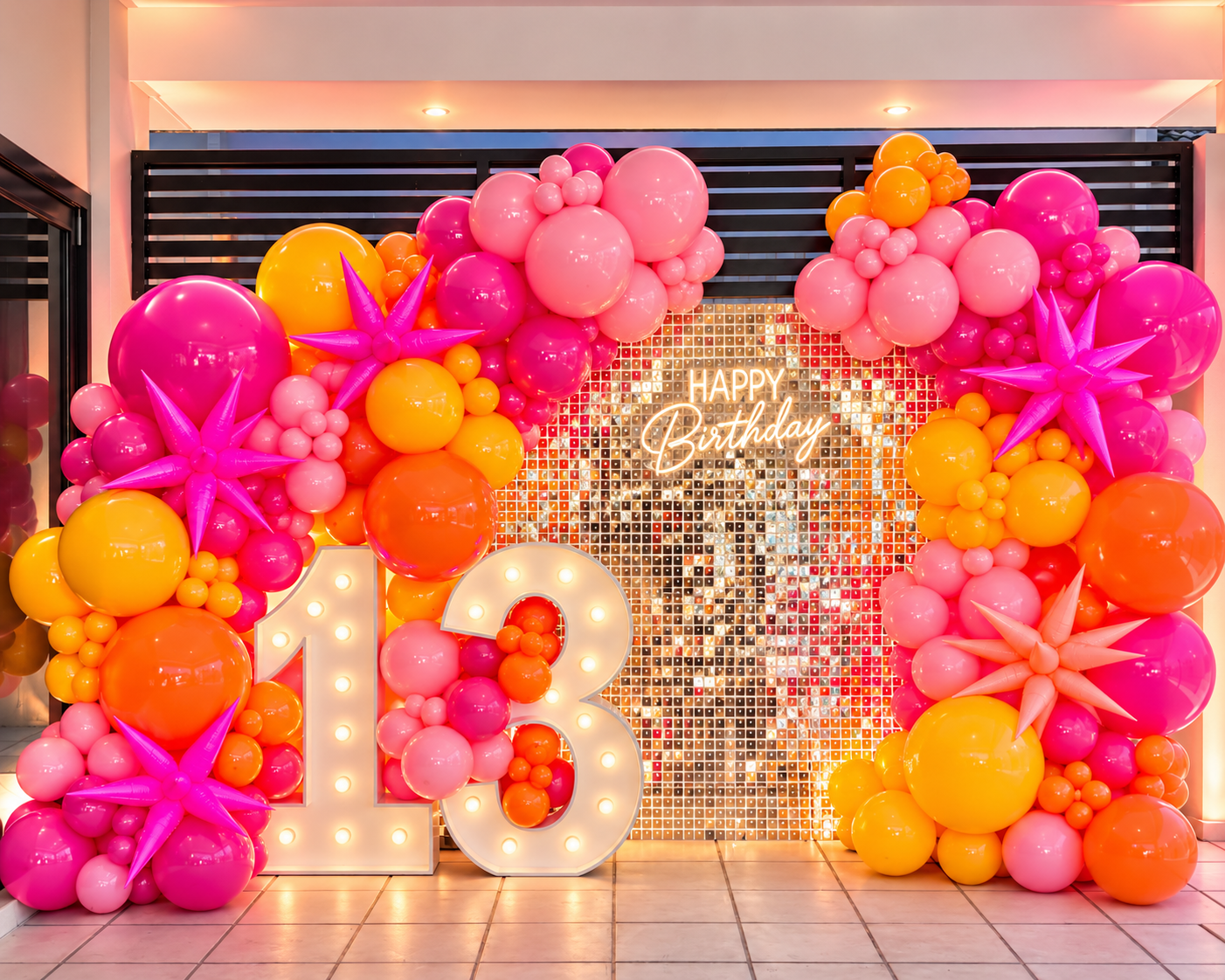 Light up number 2025 with a big balloon wall and gold shimmer wall at the Sheraton Mirage on the Gold Coast by Print Candy