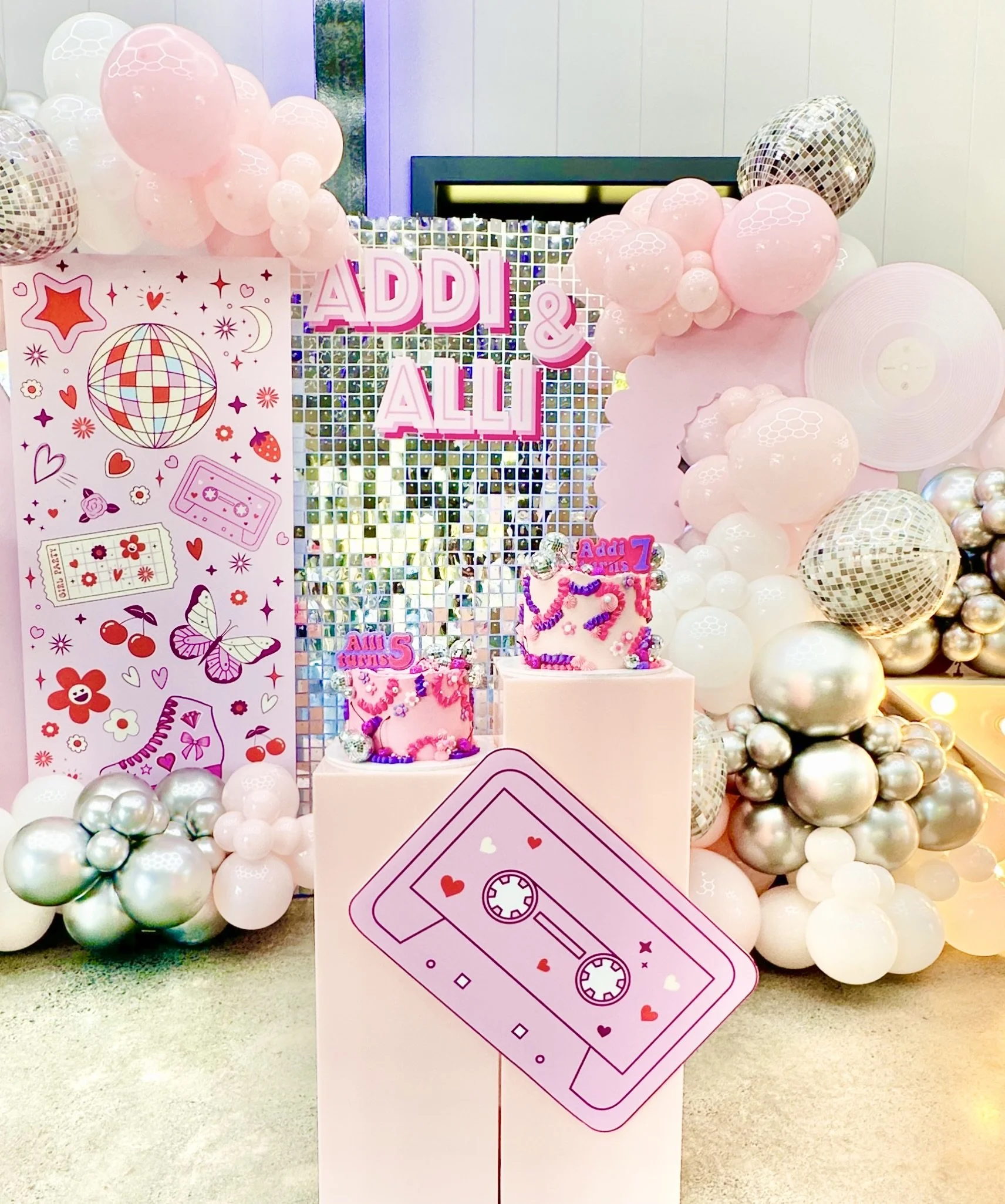 Themed disco party balloons and backdrop set up