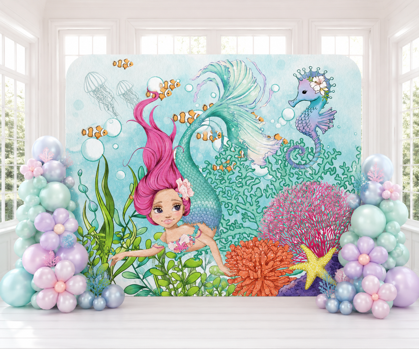 A colorful watercolor illustration of a mermaid with purple hair, underwater sea life, and coral along with jellyfish and clownfish.