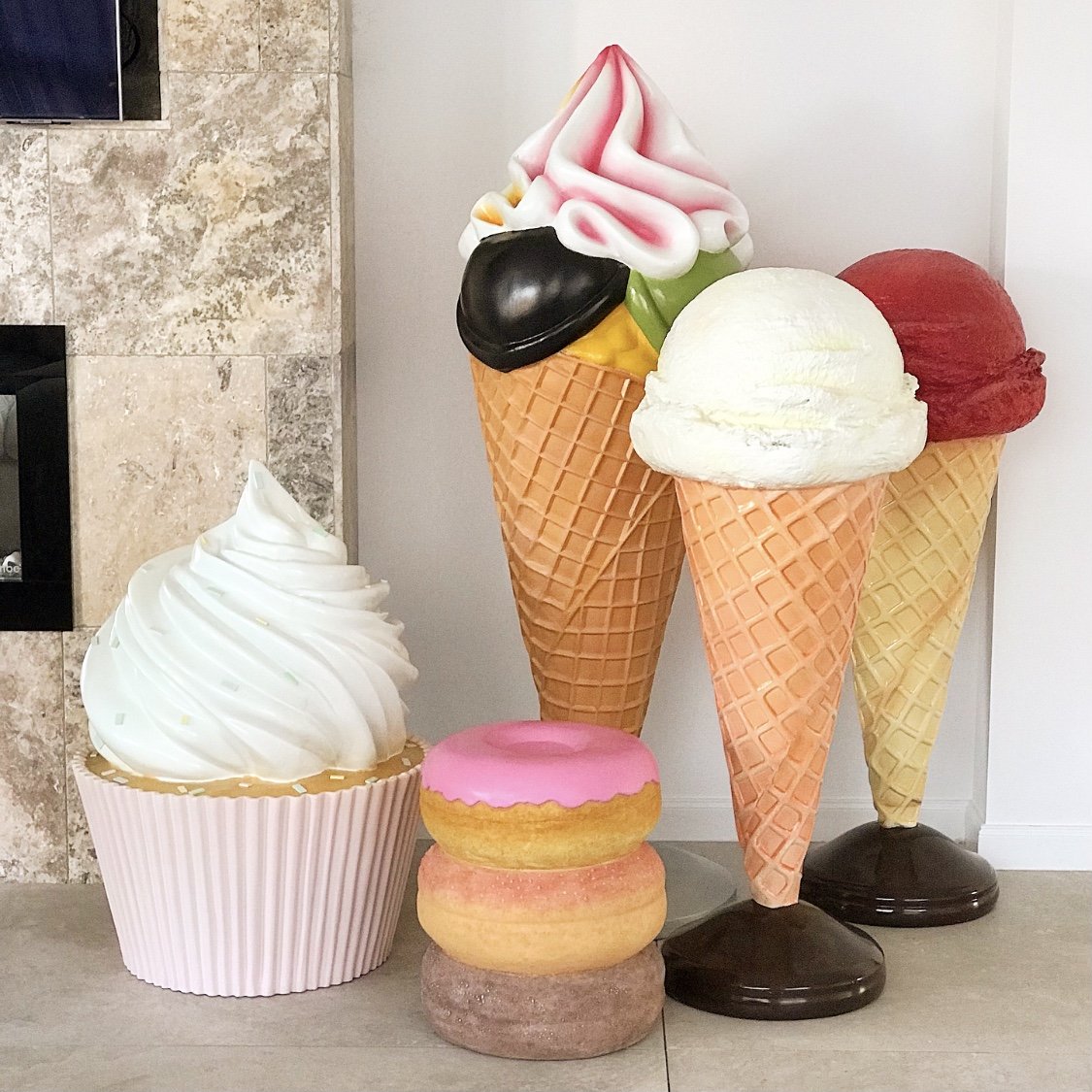 A gorgeous collection of ice creams, cupcakes and donuts props which look good enough to eat! 