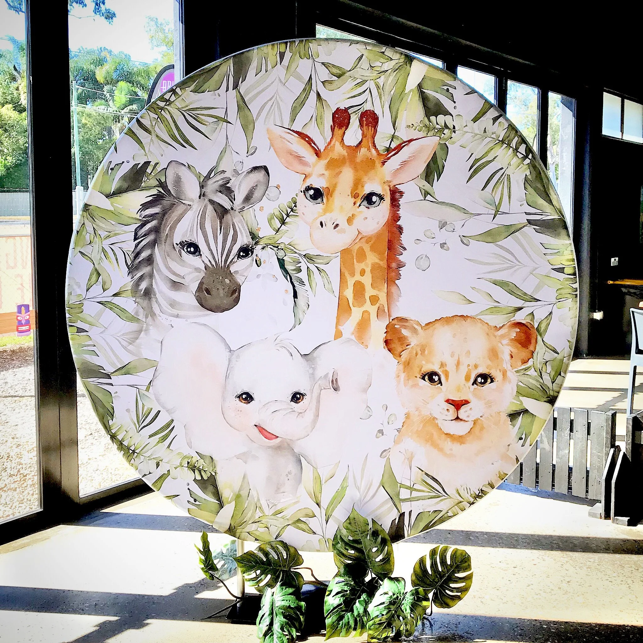 Round jungle safari themed backdrop