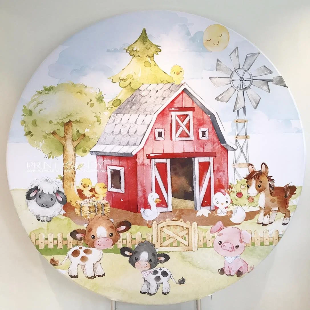 Round Barnyard themed backdrop. Featuring a red barn with farm animals including sheep, cows, pigs, ducks, a horse, and a windmill