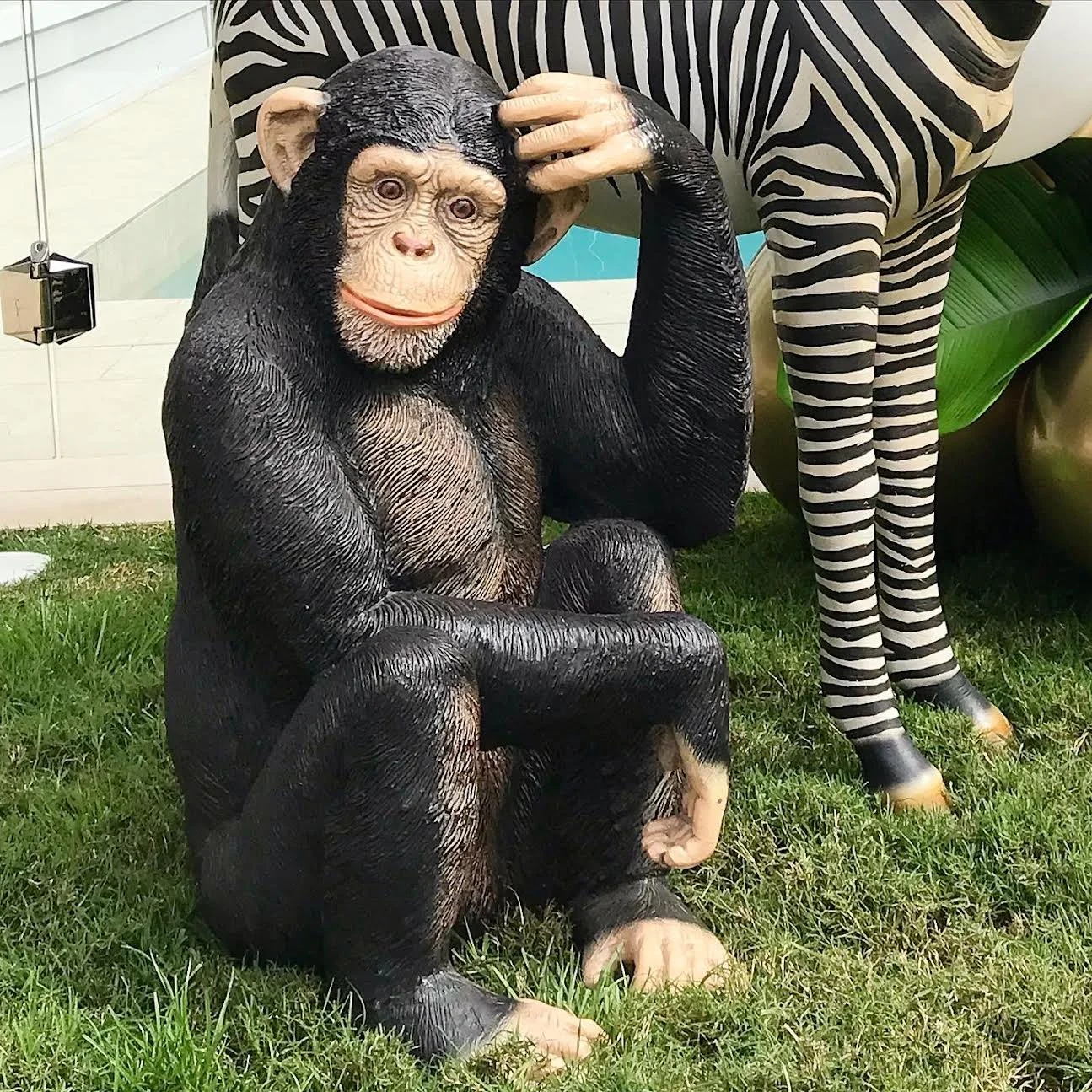 Life size sitting monkey animal prop