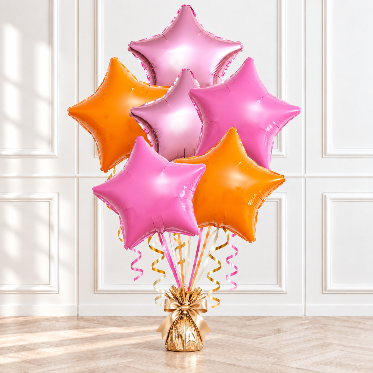 Pink and orange star helium balloon bouquet for birthday celebrations
