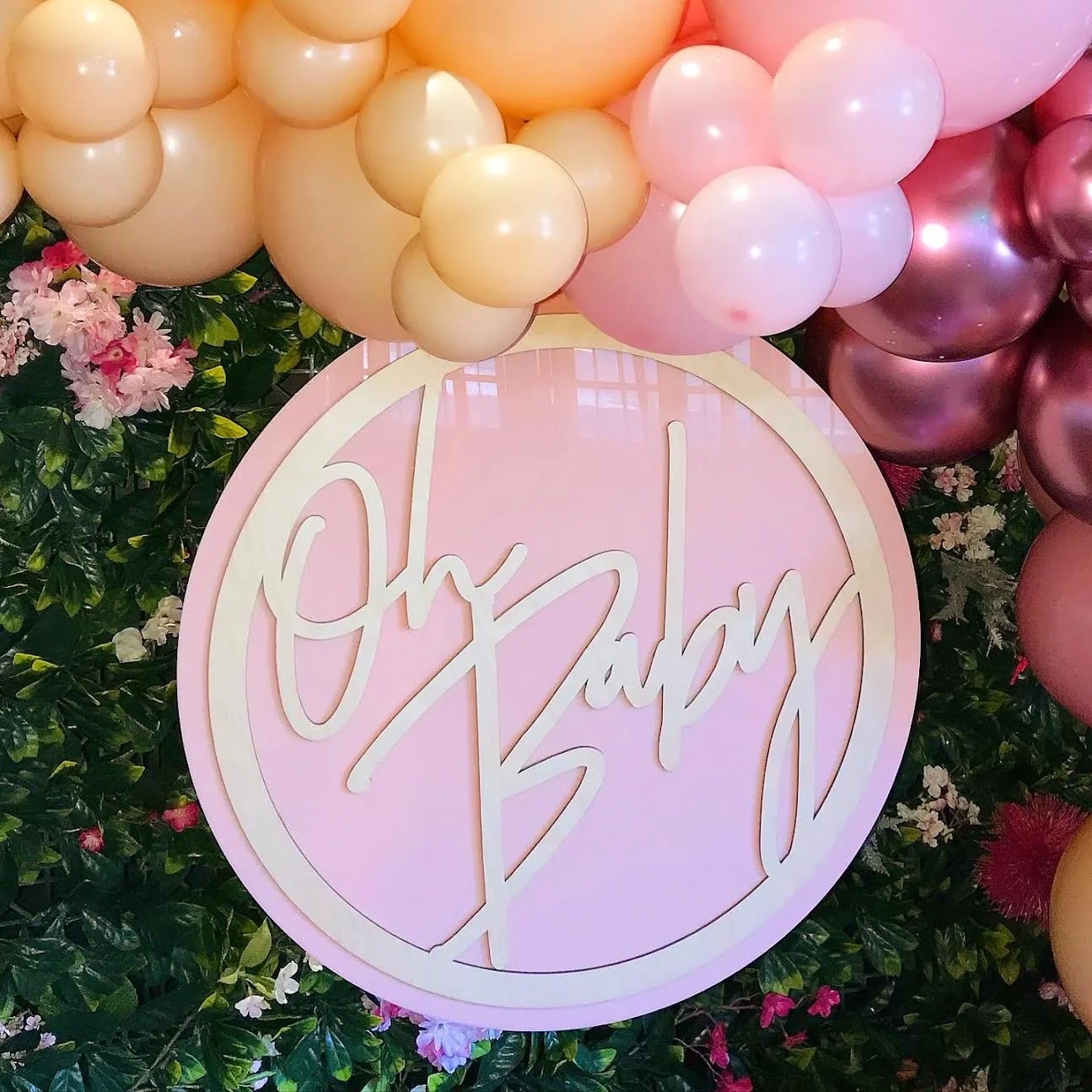 Round pink Oh Baby sign hire