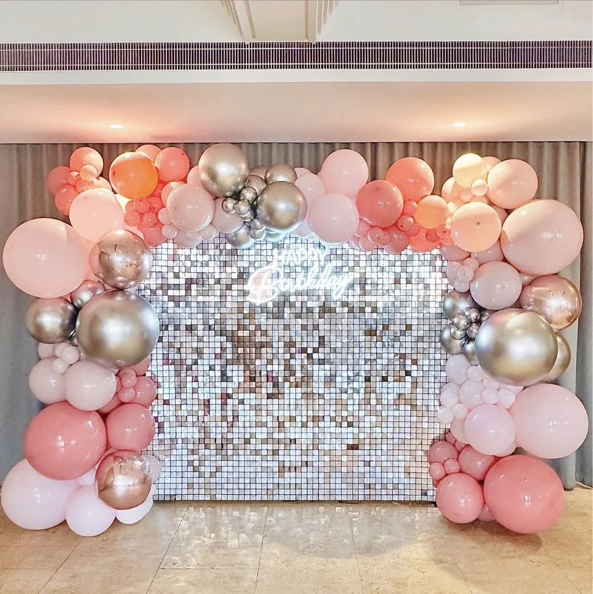 Silver shimmer wall for Waterlily's 20th Birthday Conference.jpg