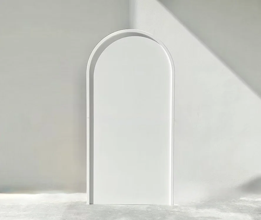 A white 2D Framed event Arch Backdrop. Featuring a subtle raised border