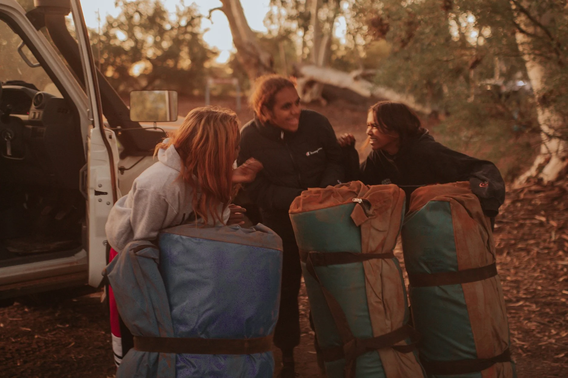 Three youths on a Western Desert Youth Ranger Program, funded by KFDF.