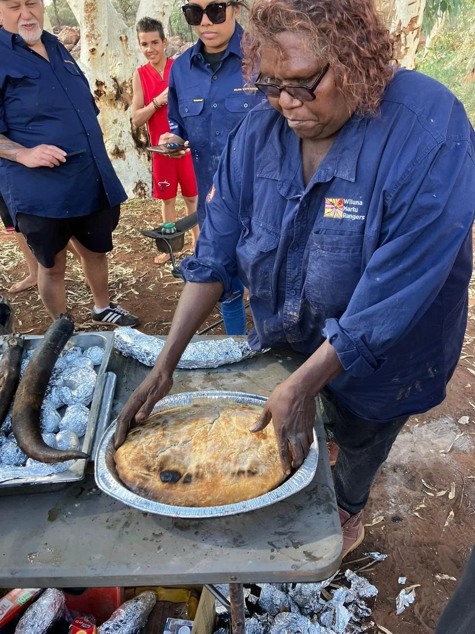 Transfer of knowledge from elders to youths in a Ranger Program.