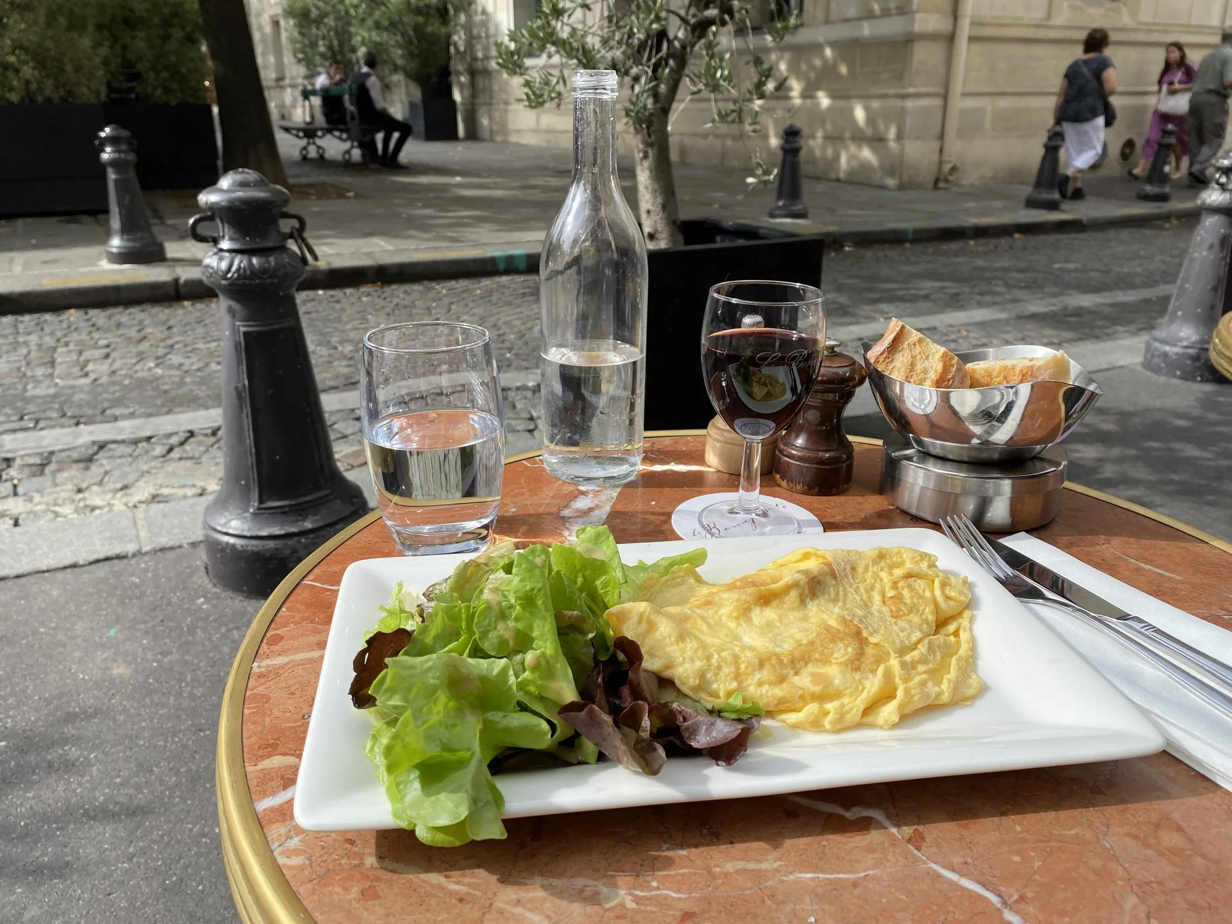 Typical lunch at a café in France representing everyday life after relocation